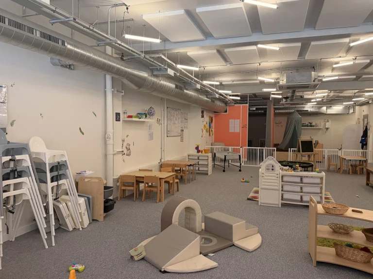 Soft play equipment and activity tables in the nursery room